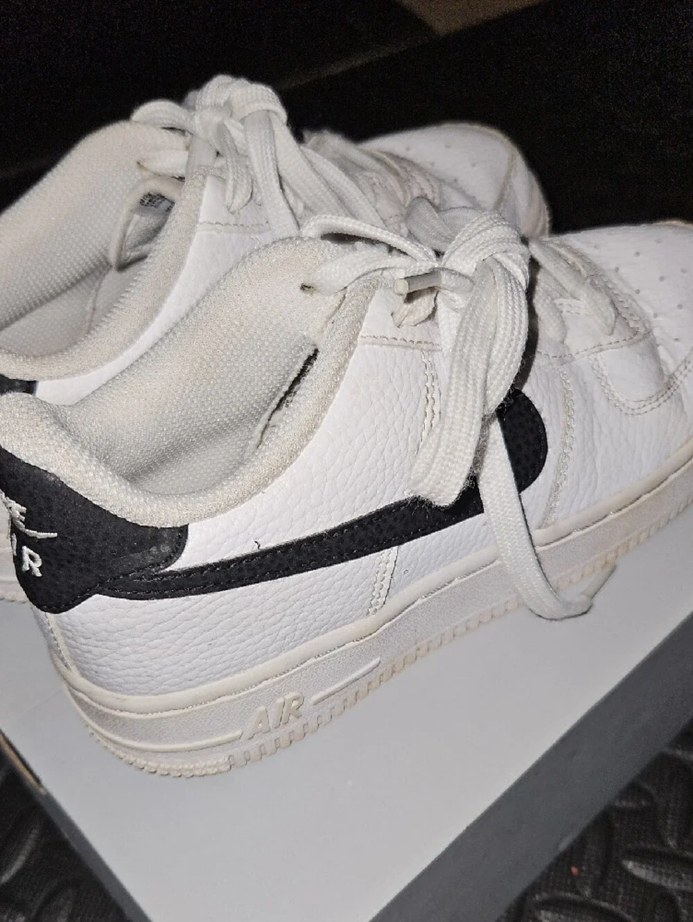 Nike White Sneakers with Black Swoosh